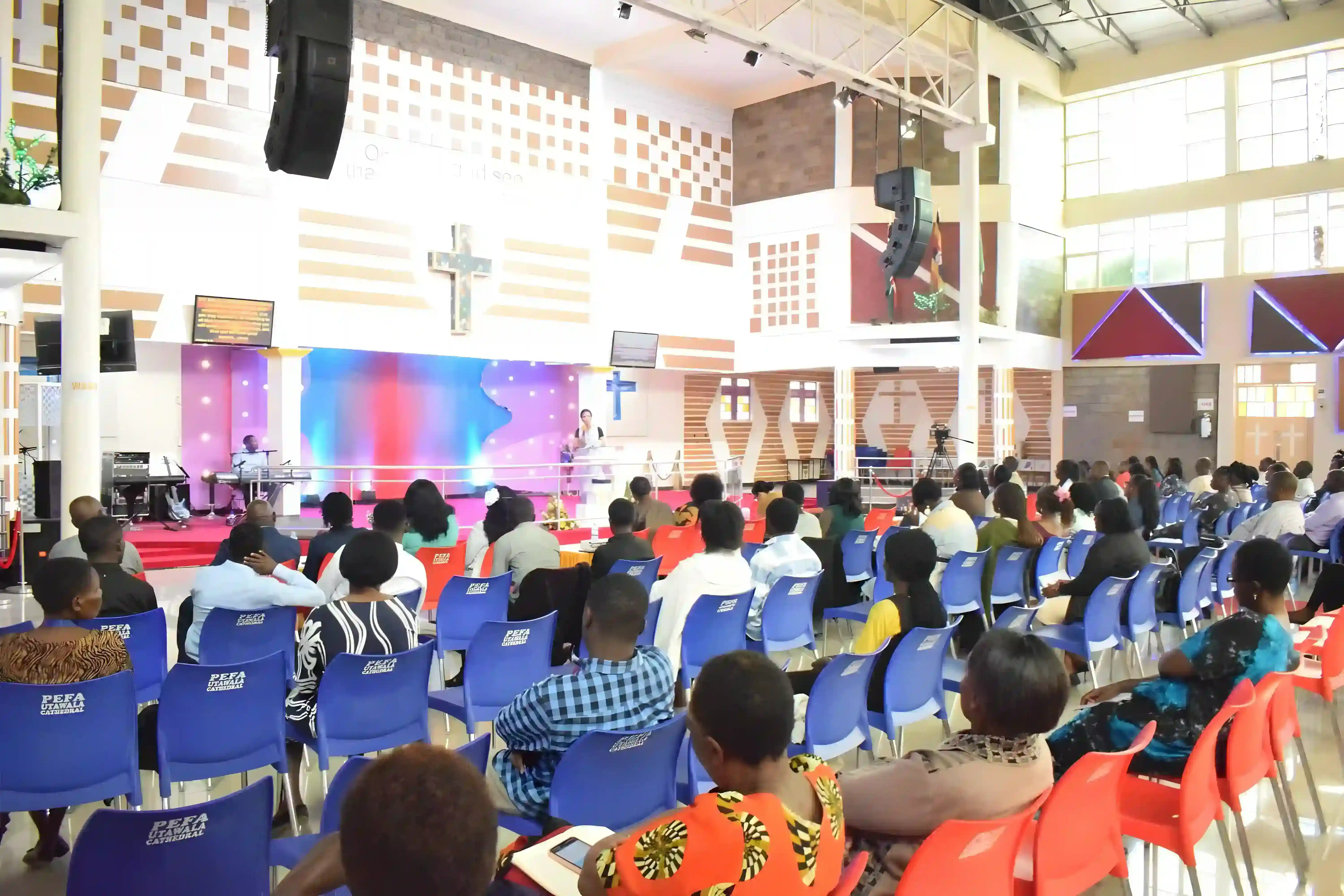 People gathered in a leadership summit, representing the global community of ARISE Ministries International